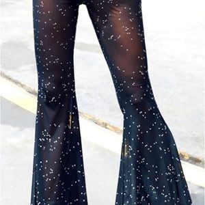 Black, sheer, mesh black pants with silver sequins. Wide leg.